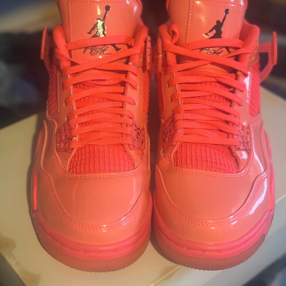 Women’s Jordan 4 retro in hot punch